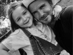 Caring dad David Beckham touched users with a picture with his daughter