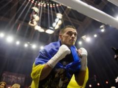 Усик песней поддержал  Динамо  после разгромного поражения от  Челси  в Лиге Европы