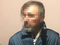 Киевская полиция задержала еще одного поджигателя магазина Roshen