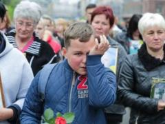 Киевляне принесли на акцию портреты погибших на Донбассе бойцов
