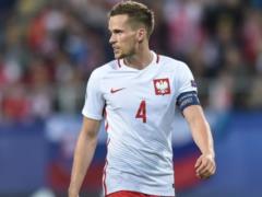 Israel fan runs out onto the field and knocks down Kenzer