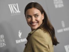 Naked Irina Shayk in thong erotically posed on the beach