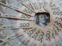 Нацбанк укрепил гривну к доллару и евро