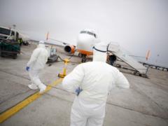 On board an airplane from China are three small Ukrainians
