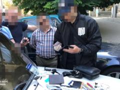 In Nikolayevshchina the employee of SBU extorted 2 thousand from the farmer. Doll. and 10 t. grains as a bribe