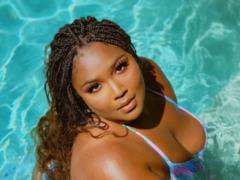 Busty Lizzo in a bikini has a quarantine photo shoot in the pool