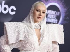 Откровенная Кристина Агилера с кляпом во рту произвела фурор видео со своими голыми фото