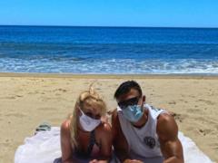 Britney Spears with a masked young boyfriend went to the beach