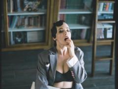Hot Dasha Astafieva in a suit completely bared her breasts in the library