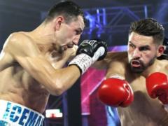 Украинец Постол не смог отобрать чемпионские пояса у Рамиреса