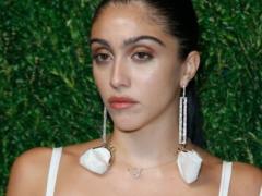Madonna s 23-year-old daughter posed topless and showed unshaven armpits