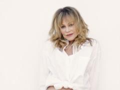 63-year-old Melanie Griffith in lingerie posed playfully in the bathroom