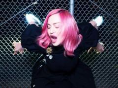 Madonna in fishnet pantyhose arranged a hot photo shoot with her 27-year-old boyfriend