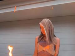 Nadia Dorofeeva in lingerie and with a lighter in her hands caused a furor in a sexy way