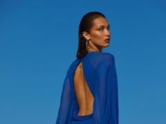 Seductive Bella Hadid with red hair bares her breasts