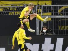 Scoring machine: football prodigy Holland sets a Champions League record