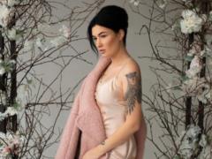 Anastasia Prikhodko in a nightie dress spoke about the meaning of her numerous tattoos on her body
