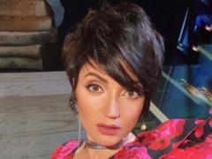 Nude Olya Tsibulskaya in the bathroom playfully covered her breasts with a towel