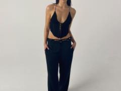 Sexy Dua Lipa in sequin top flashes her breasts