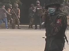 In Myanmar, police fired on protesters, killing at least 10 people