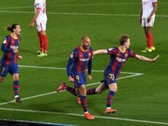 Barcelona in overtime snatched Sevilla s ticket to the Spanish Cup final