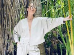The wife of Evgeny Koshevoy without underwear posed in a suit