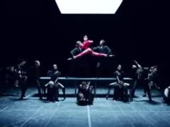 MARUV in a transparent red outfit danced in pointe shoes on the table