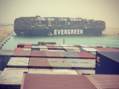 Container ship run aground blocks traffic on the Suez Canal. More than 100 ships are in traffic