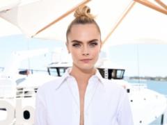 Cara Delevingne in a mini bikini boasted elastic breasts and a flat tummy