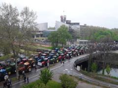 In France, more than a thousand farmers arrived on tractors to the building of the European Parliament