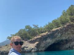 Pregnant Ekaterina Osadchaya in a swimsuit relaxed on a board
