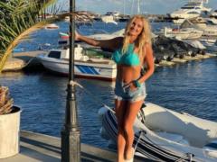 Irina Fedishin in mini-shorts and a blue bikini showed where she went on vacation