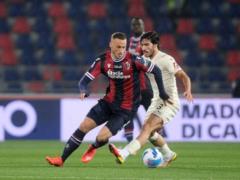 Milan gave Bologna, which finished the match with nine