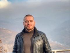 Oleksandr Krivoshapko confessed to serving in a volunteer battalion and showed his ID