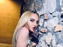 64th river Madonna with a marvelous mask and diamond teeth ran into criticism:  