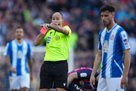 Referee of the match Barcelona - Espanyol Laos showing a record number of cards for himself