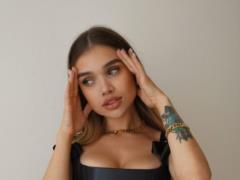 Sasha Bo in colorful lingerie boasted seductive forms