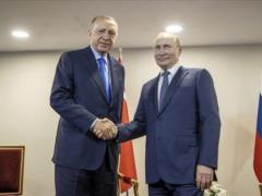 Erdogan urges Putin to  