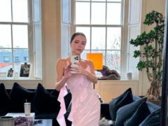 48-year-old Victoria Beckham in a pale pink dress of her own design boasted a slender waist