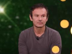 Against the backdrop of destroyed houses in the Donbass, Vakarchuk recalled his father s installation on his birthday