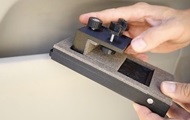 Created a device for cleaning shoes in a car