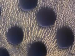 NASA releases pictures of mysterious circles on Mars