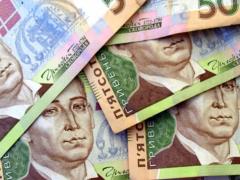 The National Bank lowered inflation forecast and raised expectations for GDP growth