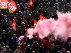 Fitch Downgrades France s Credit Rating Amid Protests Against Pension Reform