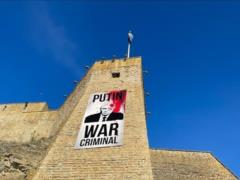 On the castle in Estonia hung a poster with the inscription:  