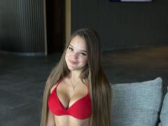20-year-old blogger Verba made a spicy photo shoot in a red bikini and showed a magnificent bust