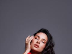 Zlata Ognevich in a bright red suit charmed with a passionate photo shoot