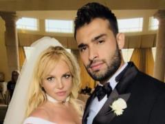 Sam Asghari showed a happy Britney Spears in footage from their wedding on the first anniversary