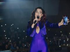 Anna Trincher took to the stage in a torn outfit:  