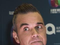 Robbie Williams started to choke during the concert